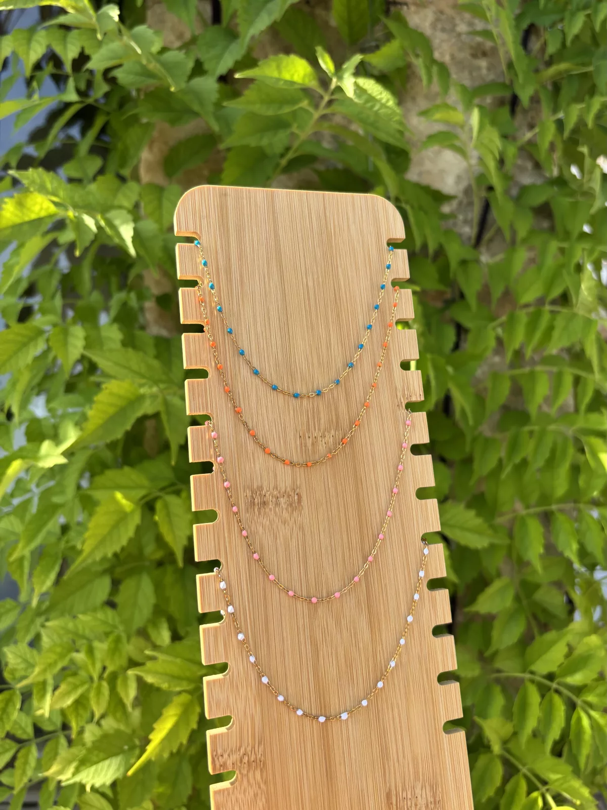 Collier Aline, monture dorée, couleur orange